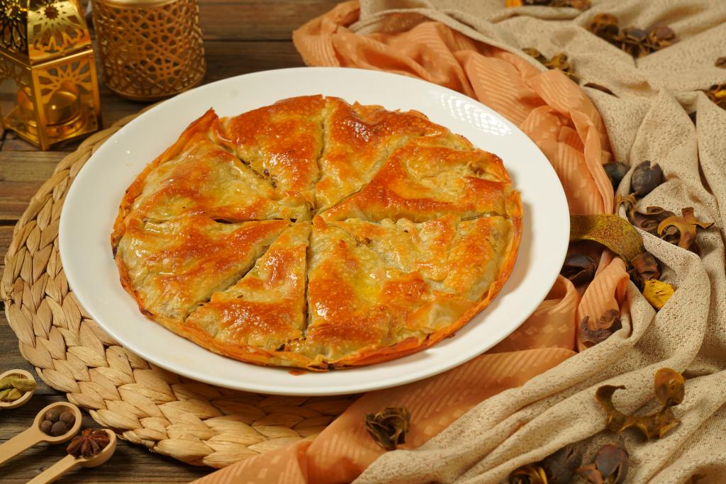 a tray of roqaq with minced meat
